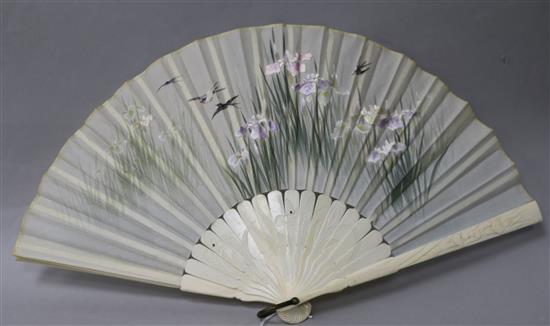 A Japanese ivory and embroidered silk fan